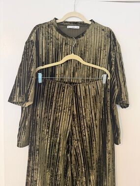 Mango matching set in textured velvet, olive green with a subtle sheen.